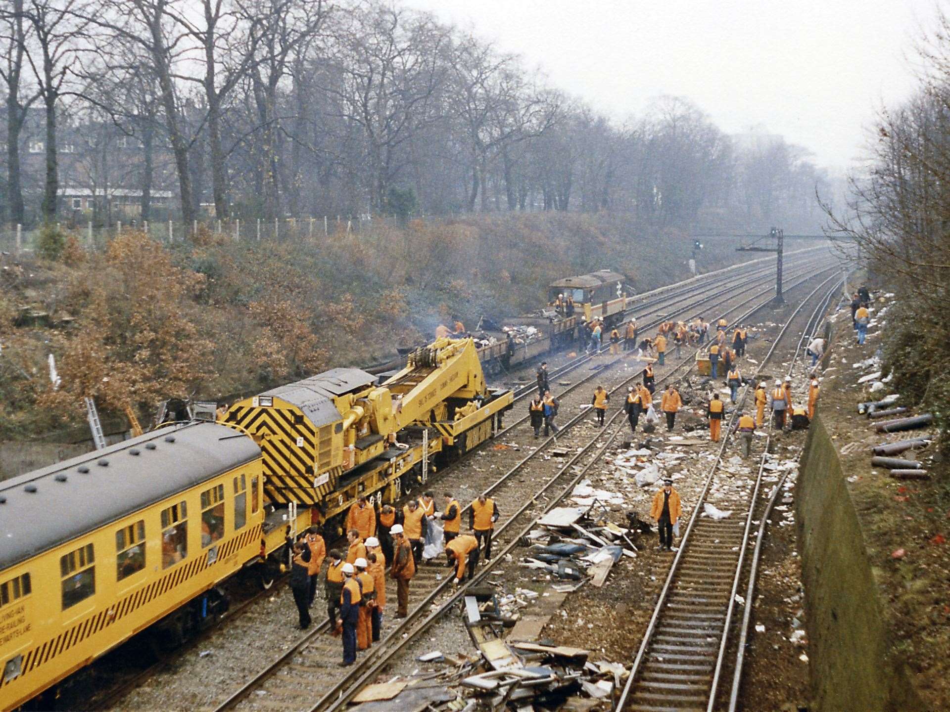 The clear up operation after the December 1988 crash west of Clapham Junction in which 35 people were killed and hundreds were injured. Picture: Ben Brooksbank.