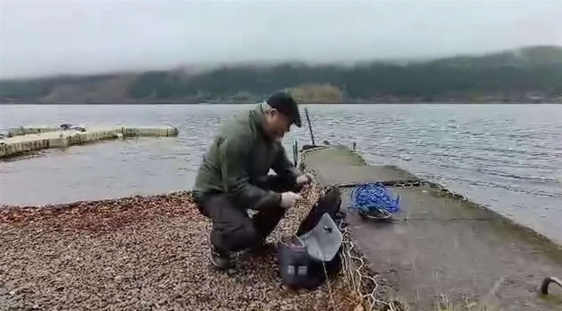 Alan McKenna, of Loch Ness Exploration, sets up the hydrophone on Loch Ness.