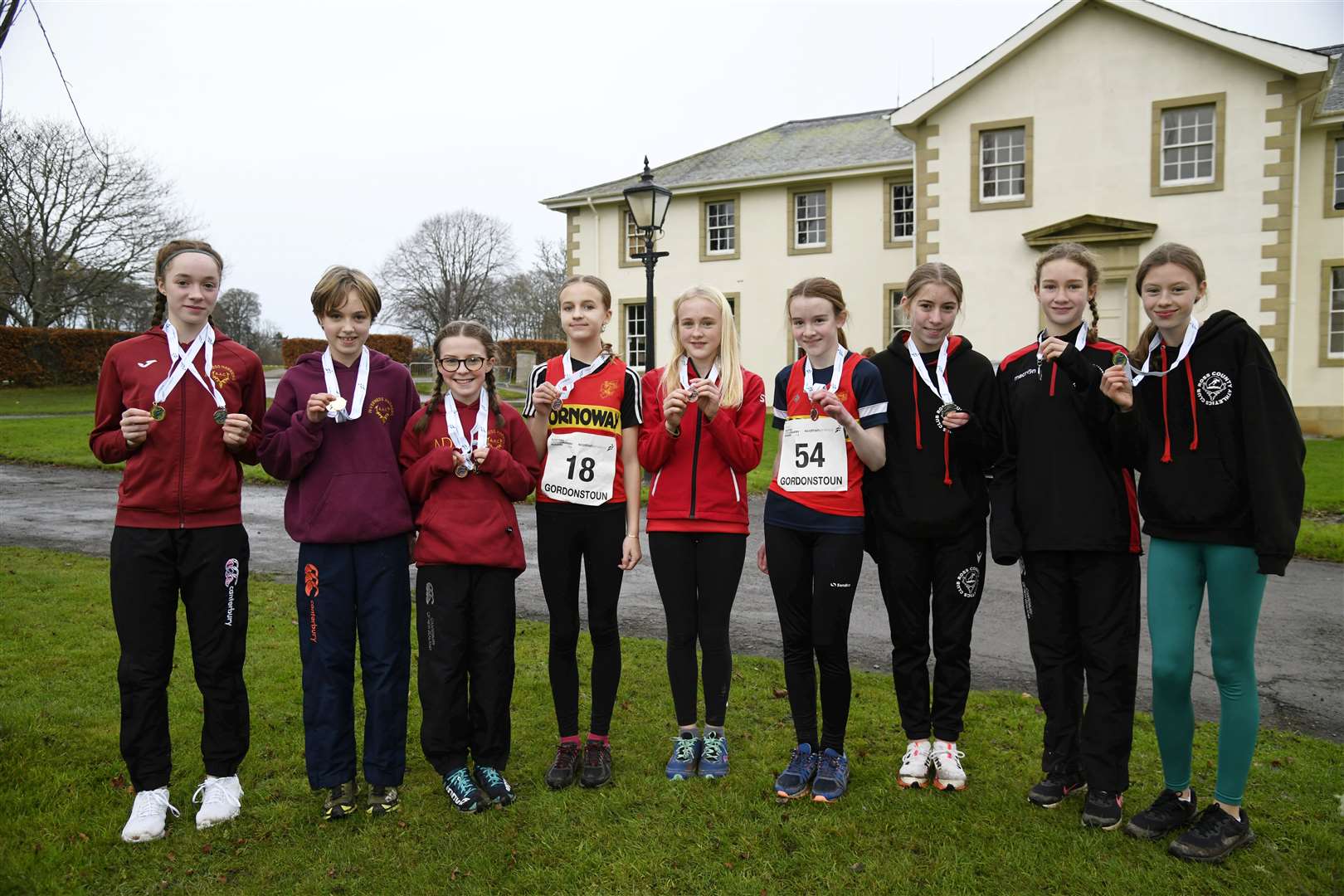 The top 3 teams from the Under 13 Girls: Inverness Harriers, Stornoway Running and Athletics Club and Ross County Athletics Club. ..North District Cross Country Championships at Gordonstoun...Picture: Beth Taylor..