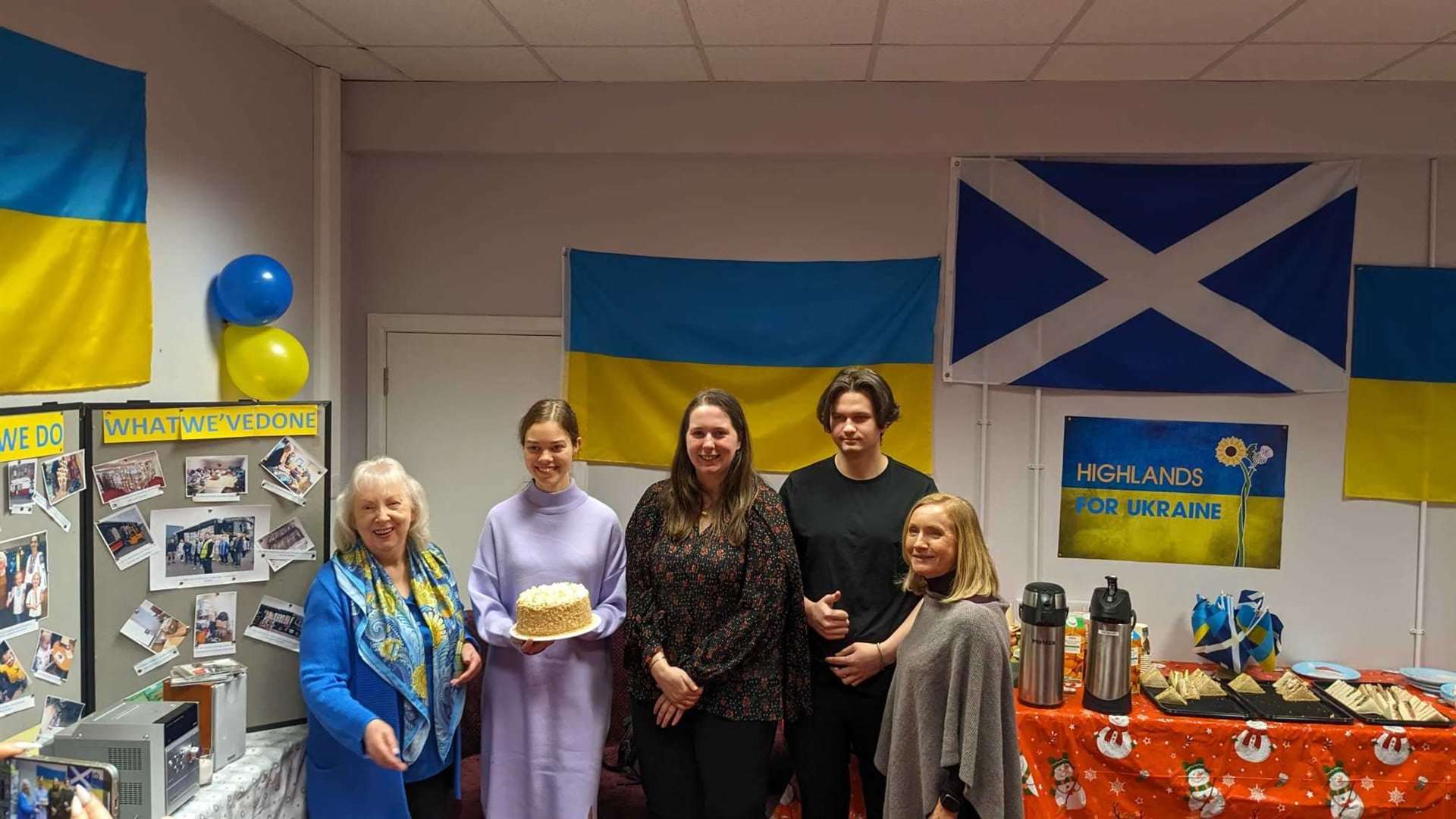Emma Roddick, Minister for Equalities, Migration and Refugees, (centre) is welcomed to the Ukrainian hub in Inverness.