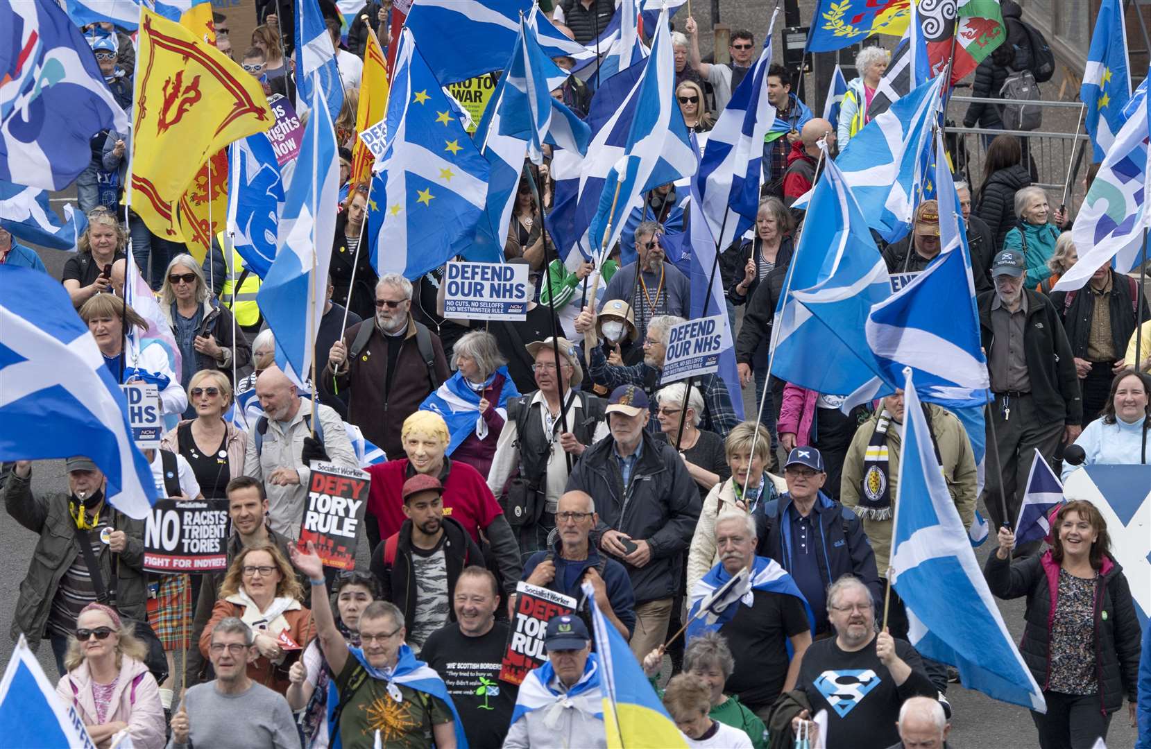 Scottish independence supporters march through Glasgow (Lesley Martin/PA)