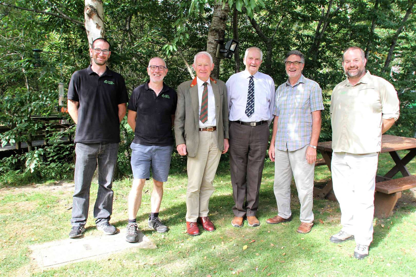 Generations of foresters at today's birthday party: from left, Tom Cameron (area wildlife manager) Brian Duff (Strathspey forester) Bryce Reynard (forester 1973-76) Alastair MacLeod (head forester '79 - 87) Tony Hinde (a senior forester whose link to Glenmore goes back to 1972) and Neil McInnes (2000-20008). Picture: Frances Porter
