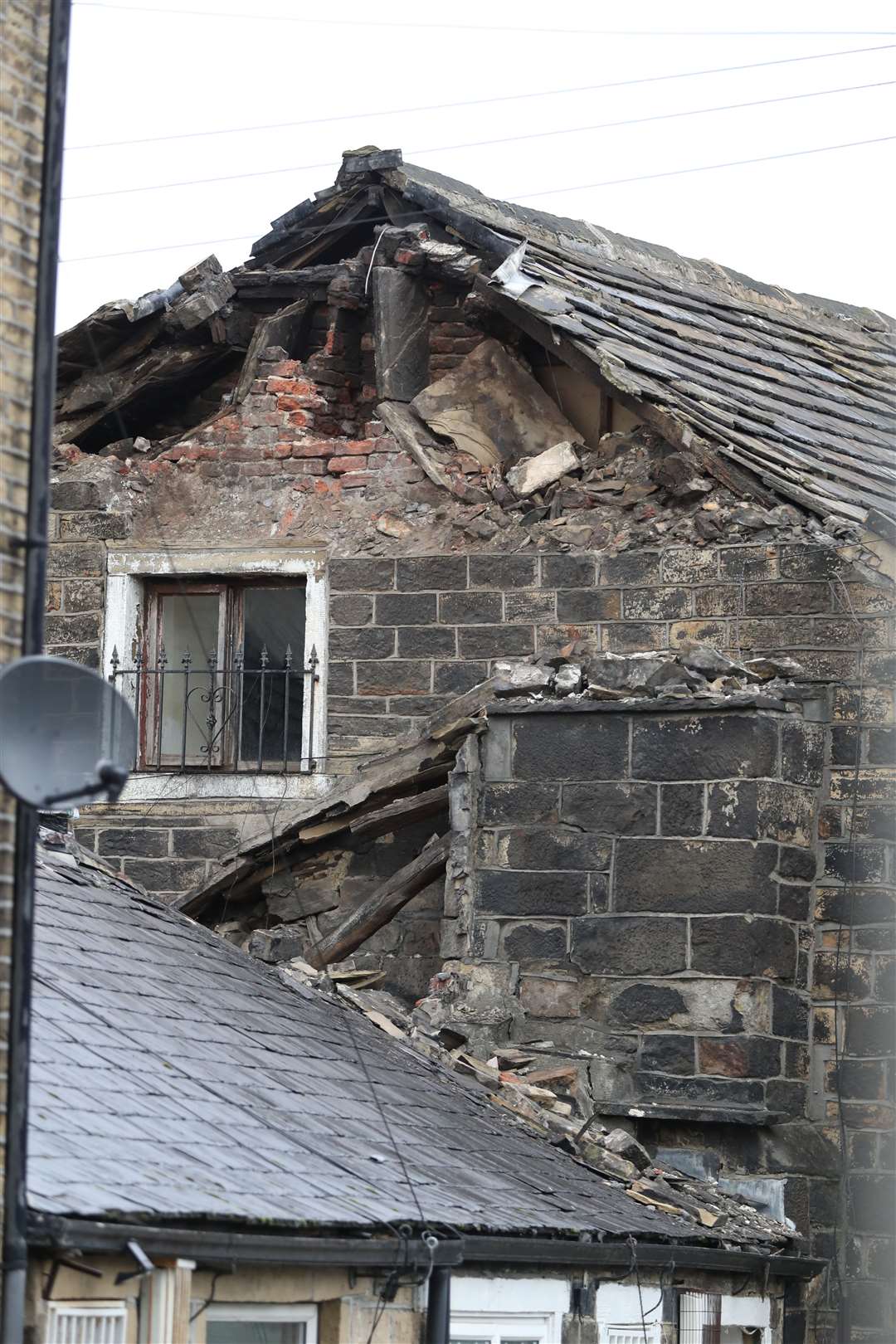 Damage to the roof of a house in Knights Fold (Peter Byrne/PA)