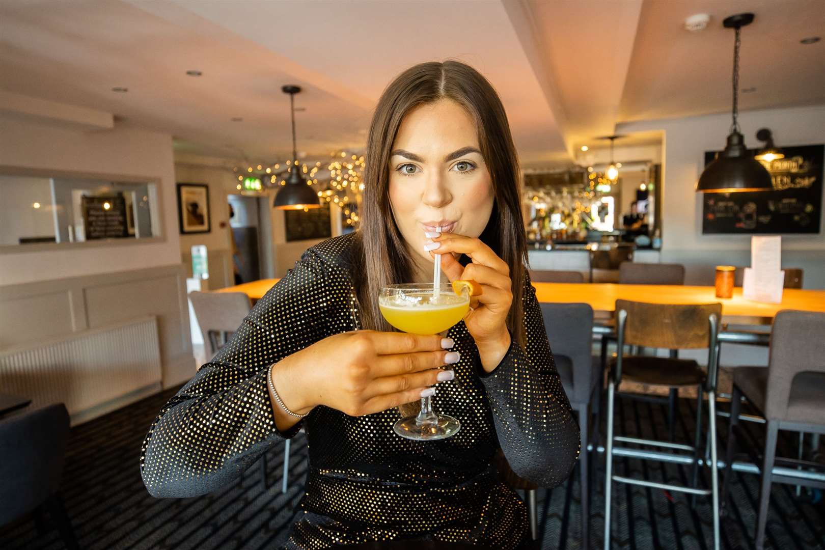 Rhianna Bell and her "Rhi's Bee Knees" cocktail.