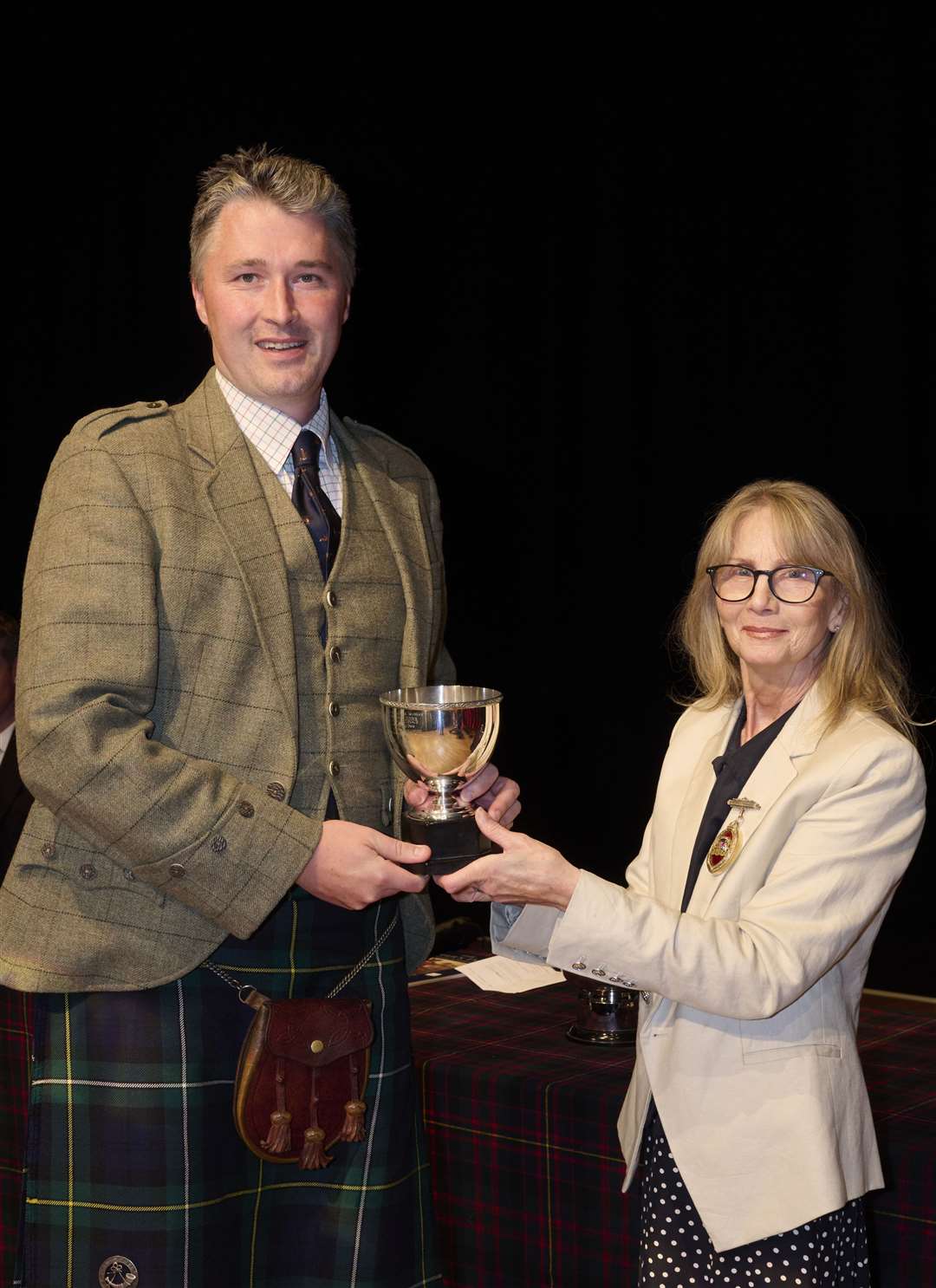 Glynis Campbell-Sinclair (the Provost of Inverness) with Jamie Forrester who won the 2nd Gold Medal at the Northern Meeting 2022 which was held at Eden Court in Inverness.