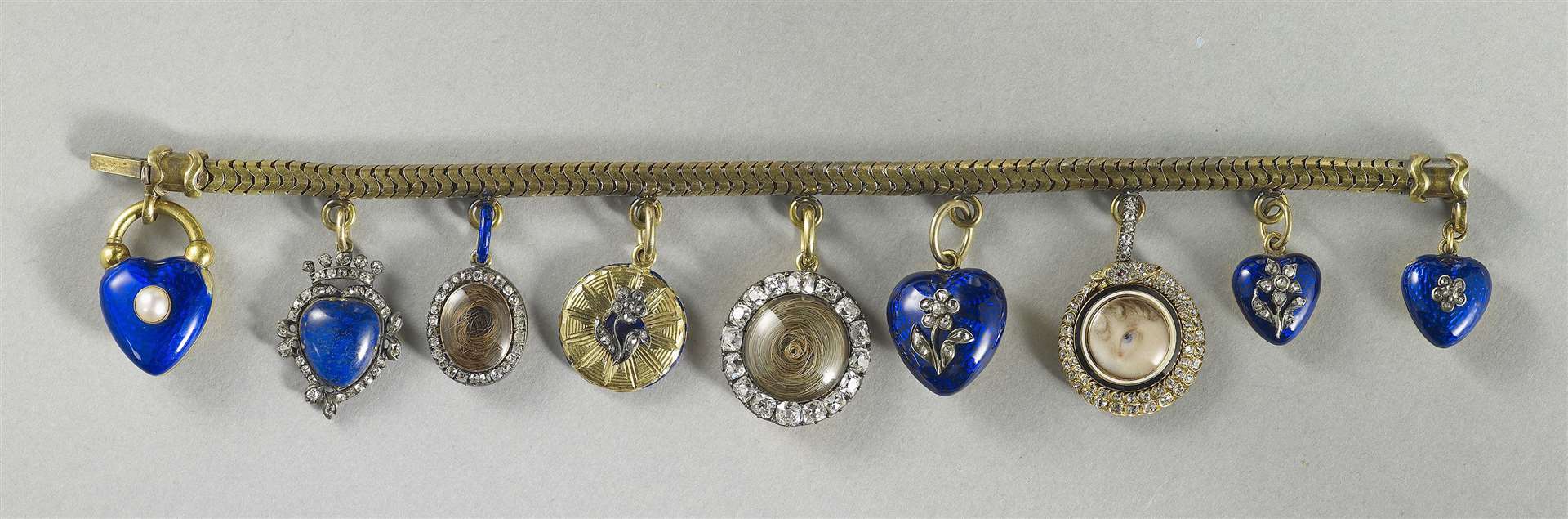Bracelet with nine lockets, one with a miniature of Princess Charlotte’s left eye (Royal Collection Trust/HM King Charles III/PA)