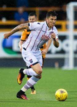 Ross County's Christoper Routis looks for a way through in Tuesday's 3-2 defeat at Alloa.
