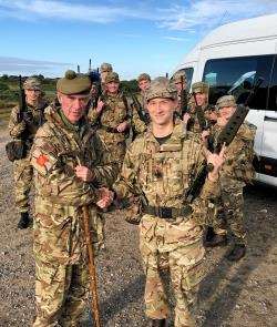 Euan Stewart receiving his field promotion from the battalion’s Commandant Colonel Iain Cassidy.