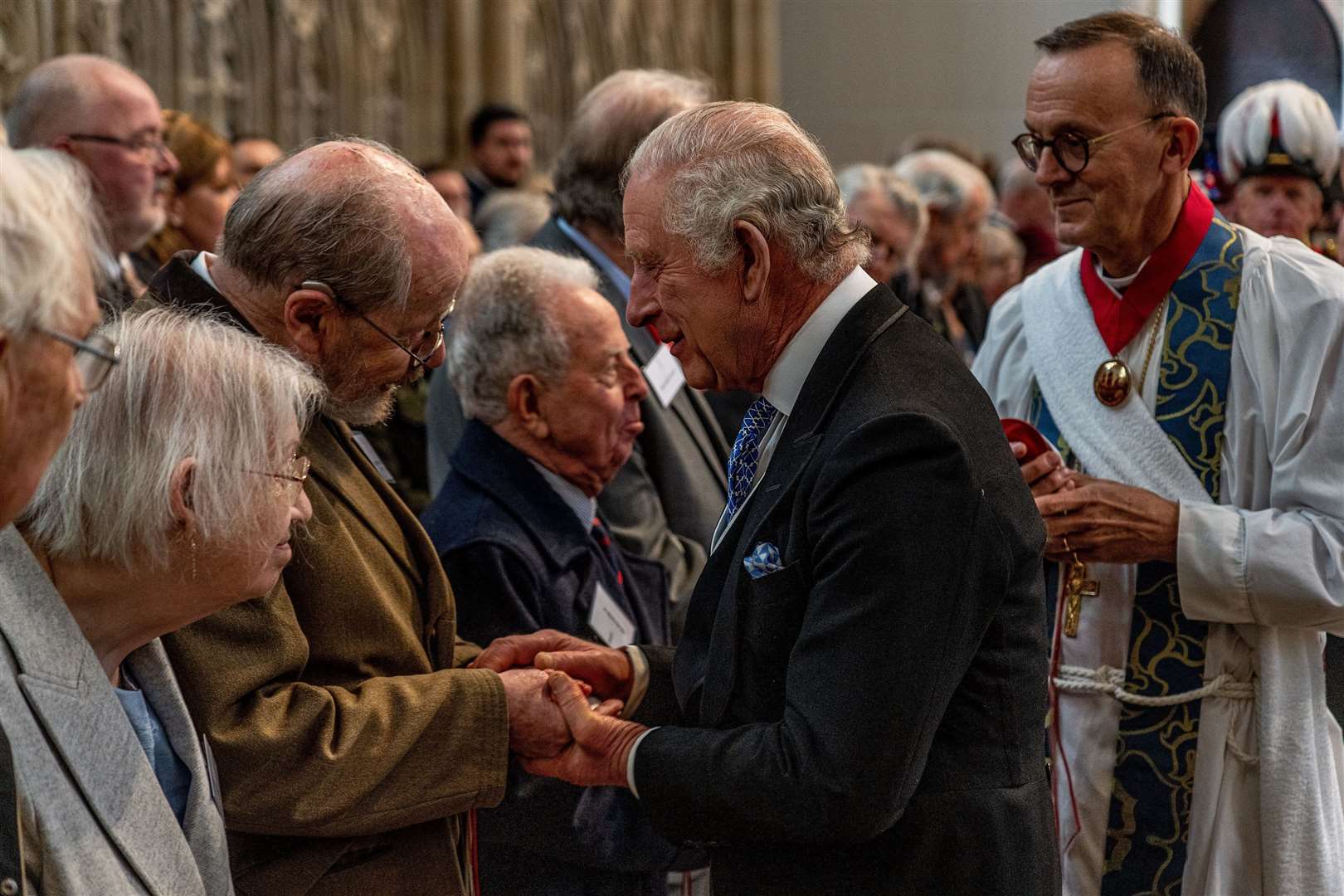 The King handing out Maundy money during the Royal Maundy Service at York Minster last year (Charlotte Graham/Daily Telegraph/PA)