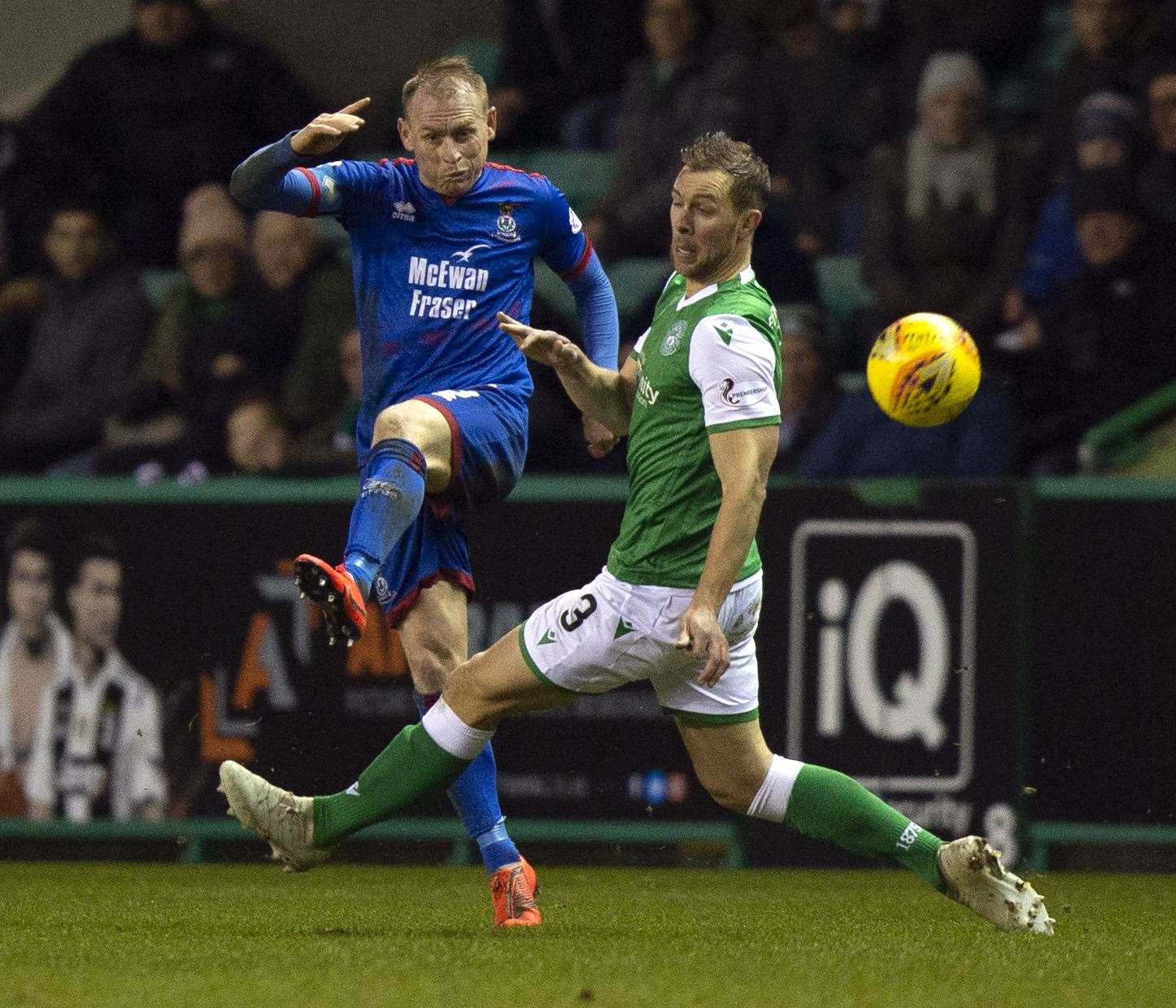 Picture - Ken Macpherson, Inverness. Scottish Cup Quarter-finals. Hibs(5) v Inverness CT(2). 28.02.20. ICT's Carl Tremarco clears the danger from his opposition number Hibs' Steven Whittaker.