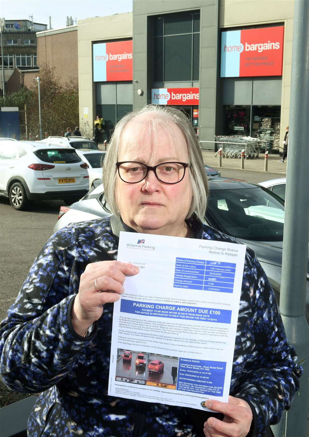 Ruth Beddall holding the parking fine she received. Picture: James Mackenzie.