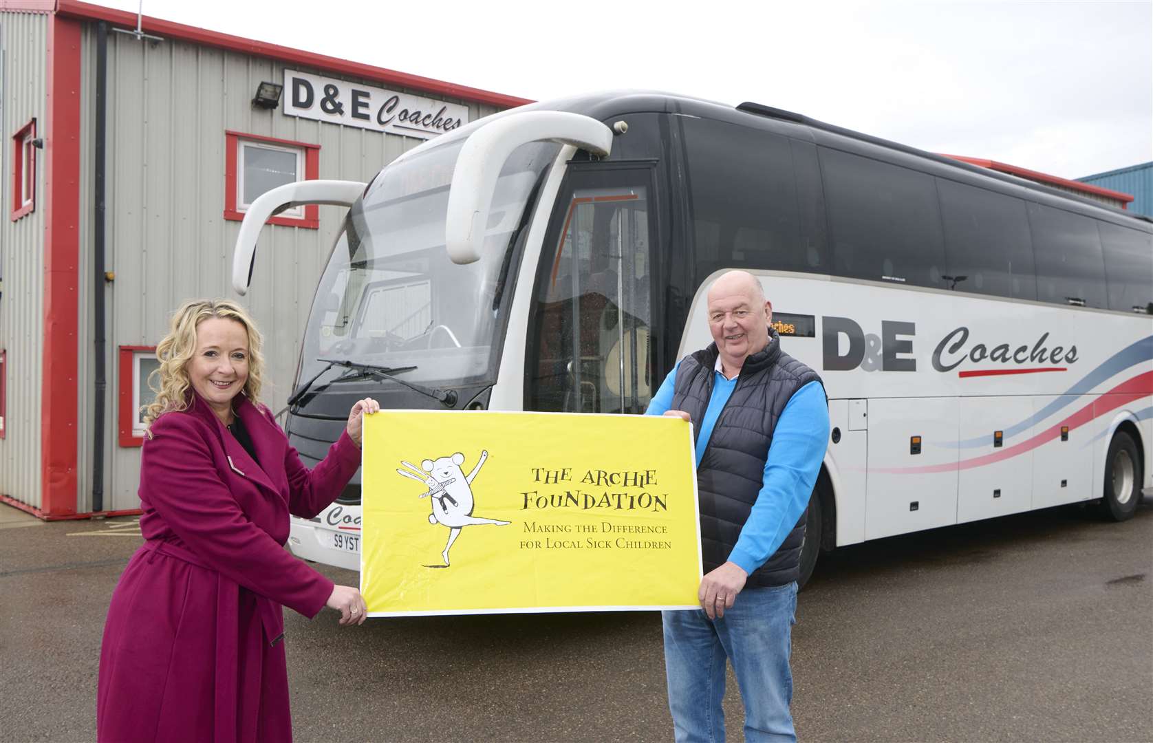 Archie Highland chairwoman Mary Nimmo and with D&E Coaches owner Donald Mathieson.