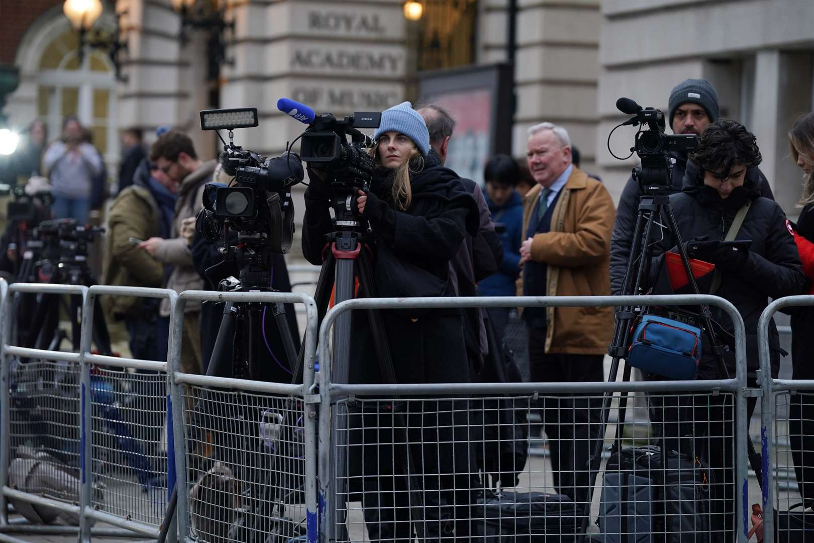 Media gathered opposite the London Clinic (Lucy North/PA)