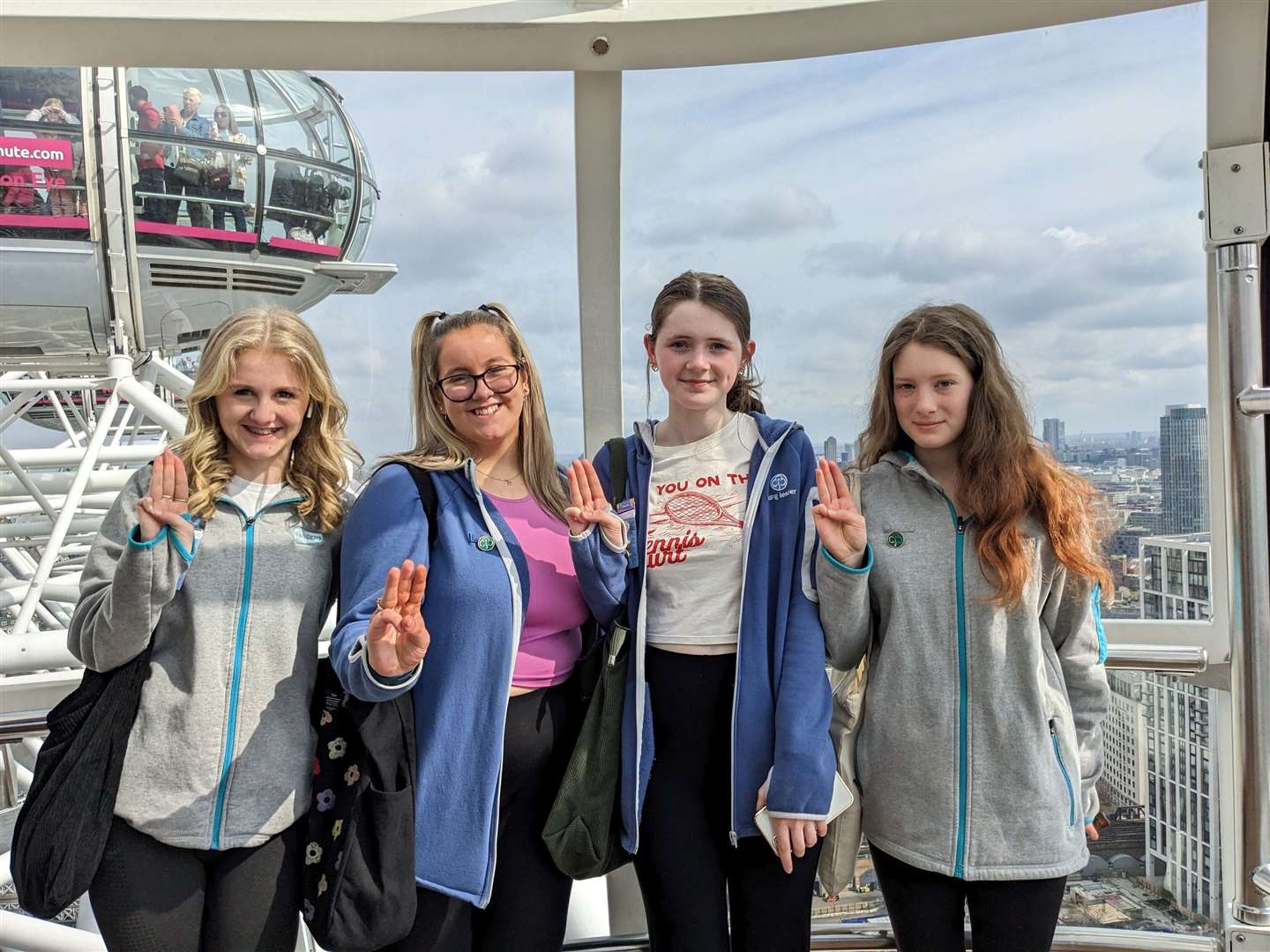 Lucy, Kayla, Erin and Cara from 4th Inverness Rangers make their Girlguiding promise on the London Eye.