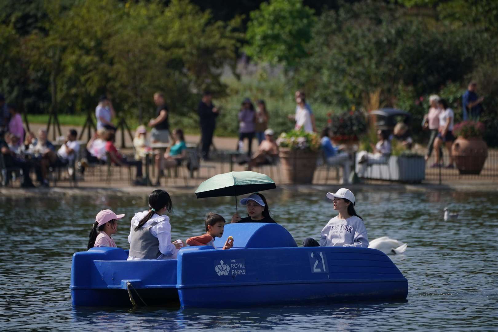 The boating lake at Hyde Park did brisk business on a sunny day (Jonathan Brady/PA)