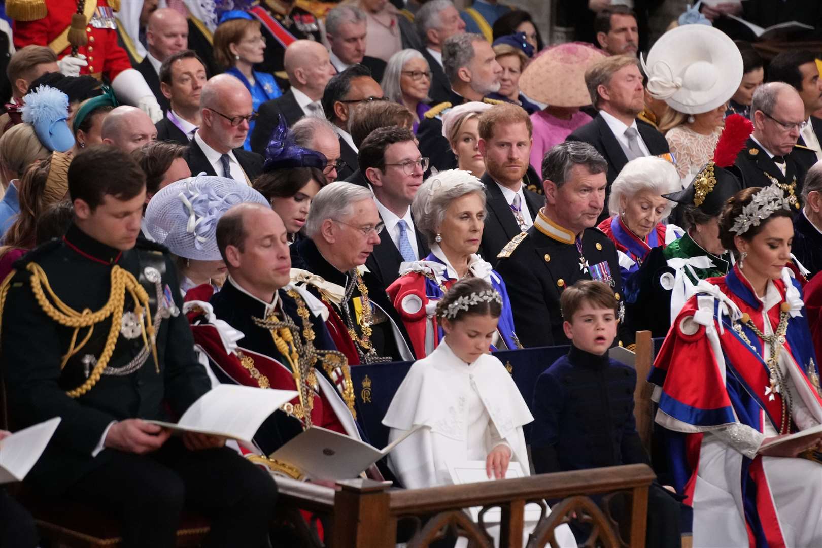 Harry in the third row behind the Waleses, the Duke and Duchess of Gloucester and Vice Admiral Timothy Laurence during the coronation ceremony (Victoria Jones/PA)