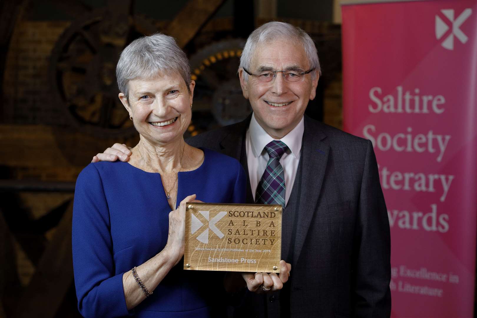 Bob and Moira accepting The Saltire Society Scottish Publisher of the Year award. Picture: Graham Clark