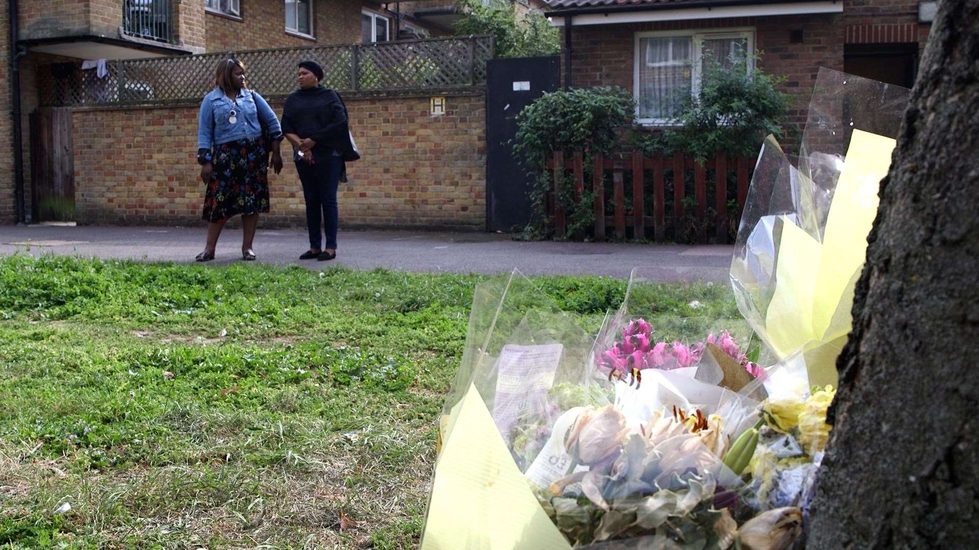 Mariama Baby Kamara (right) revisits the scene of her son’s killing (PA Video/PA)