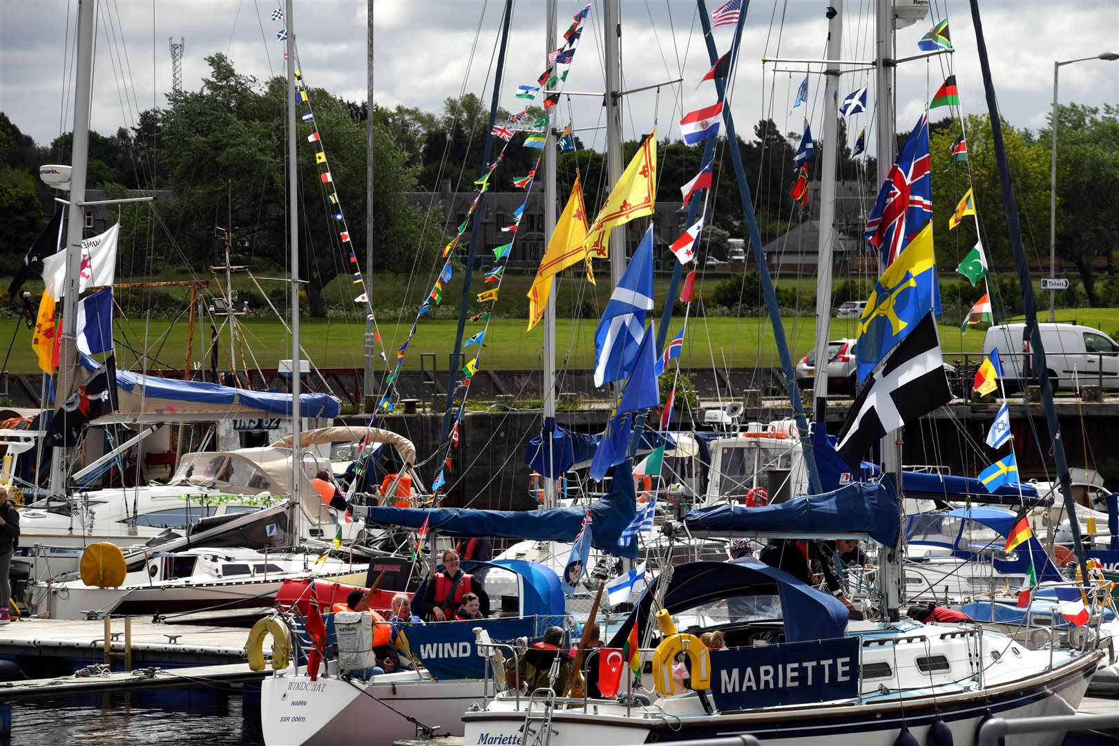 Vessels decked with flags in Nairn Harbour.