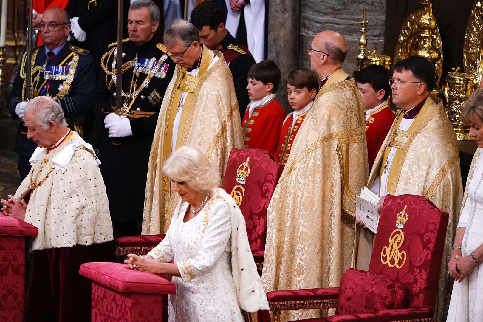 Prince George watches King Charles III and Queen Camilla during their coronation ceremony in Westminster Abbey, London. Picture date: Saturday May 6, 2023.