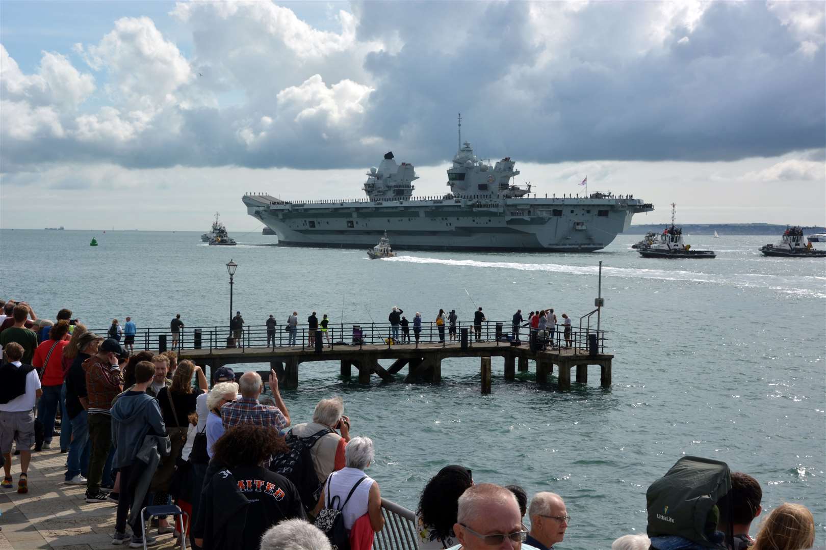 Families and well-wishers wave off HMS Prince of Wales (Ben Mitchell/PA)