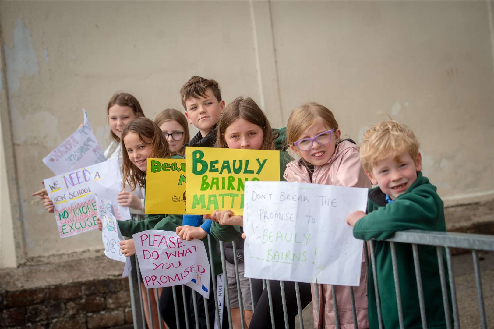 Beauly Bairns Matter, say children as they highlight the need for a new school in Beauly with homemade posters.