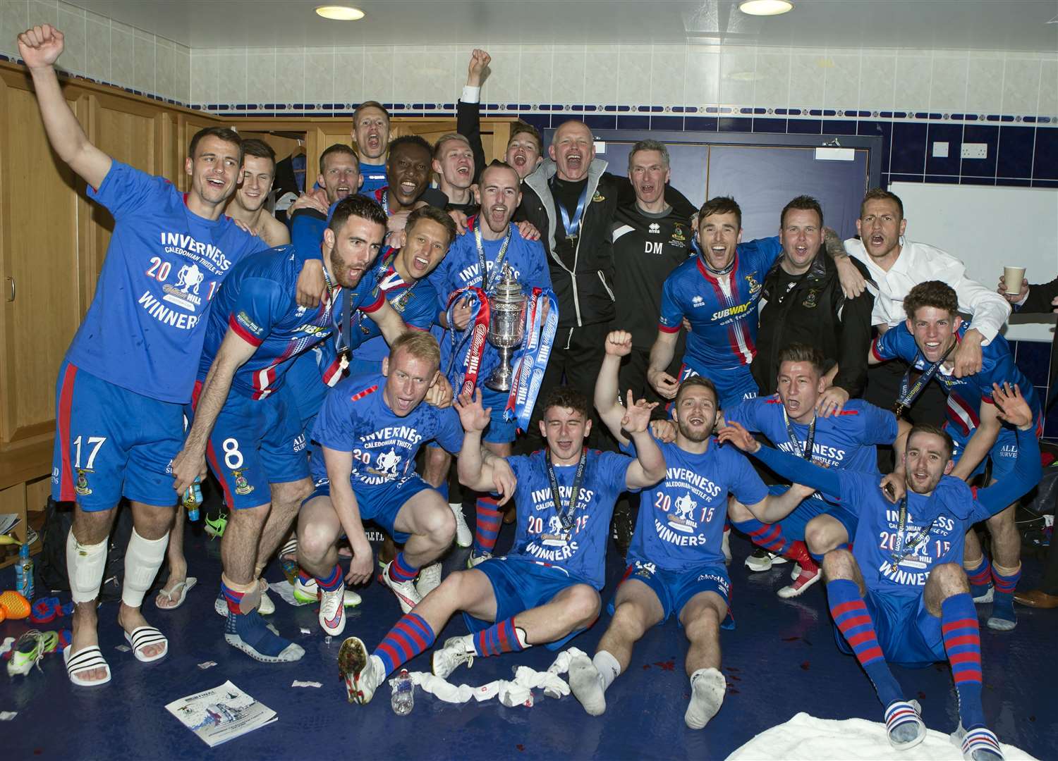 Caley Thistle number 8 Ross Draper celebrates the Scottish Cup triumph with his Caley Thistle team-mates. Picture - Ken Macpherson