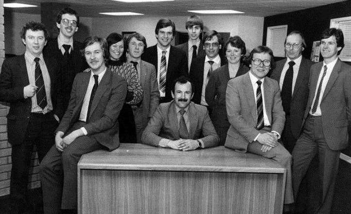 Tom Flockhart (seated, centre) with his team shortly after teh launch of Captital Copiers in Edinburgh in 1979