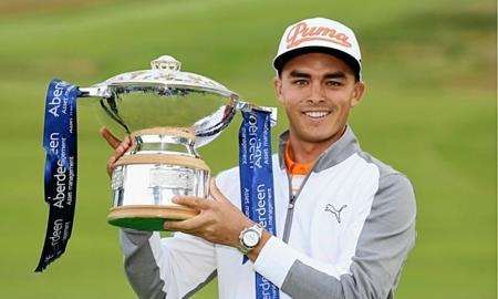 Rickie Fowler with trophy