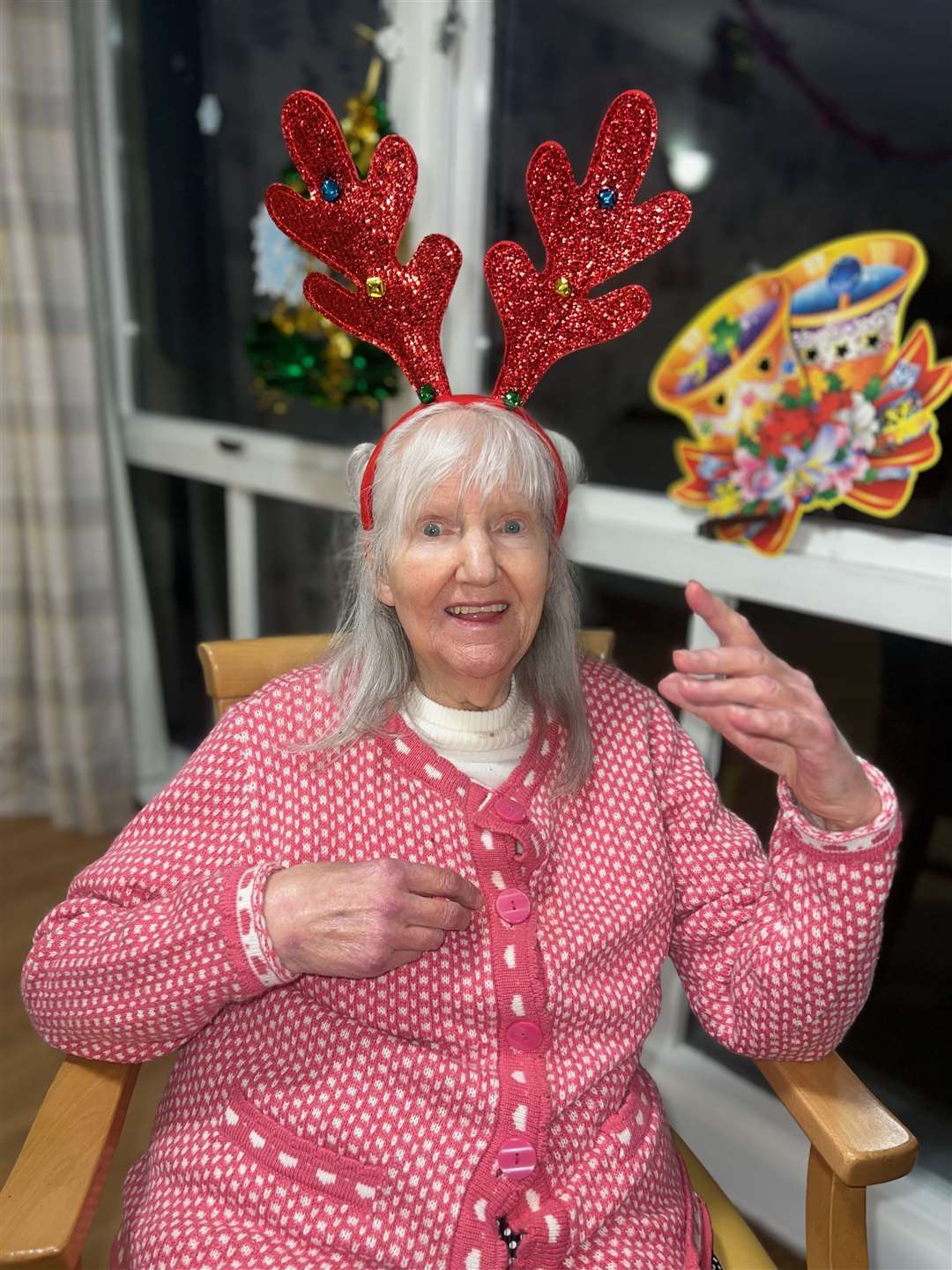 Resident Margaret O'Sullivan enjoys some festive fun.