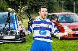 Newtonmore captain Scott Chisholm with the Orion Premiership trophy. Picture: Neil Paterson.
