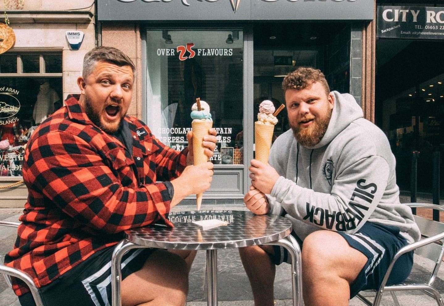 Luke and Tom Stoltman with the Stoltman cone. Picture from @luke.stoltman