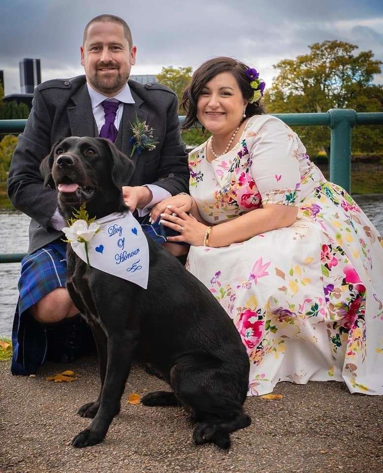 Black labrador Bressay was able to be part of owners Derek and Laura's big day thanks to a special service.