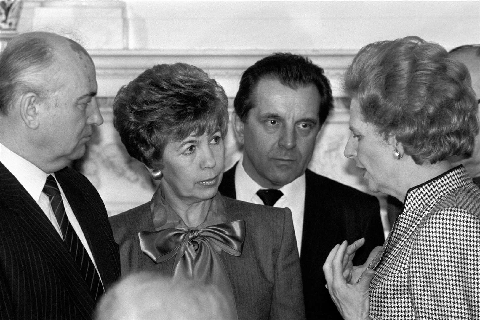 Then prime minister Margaret Thatcher chats to Soviet leader Mikhail Gorbachev and his wife Raisa (Martin Keene/PA)