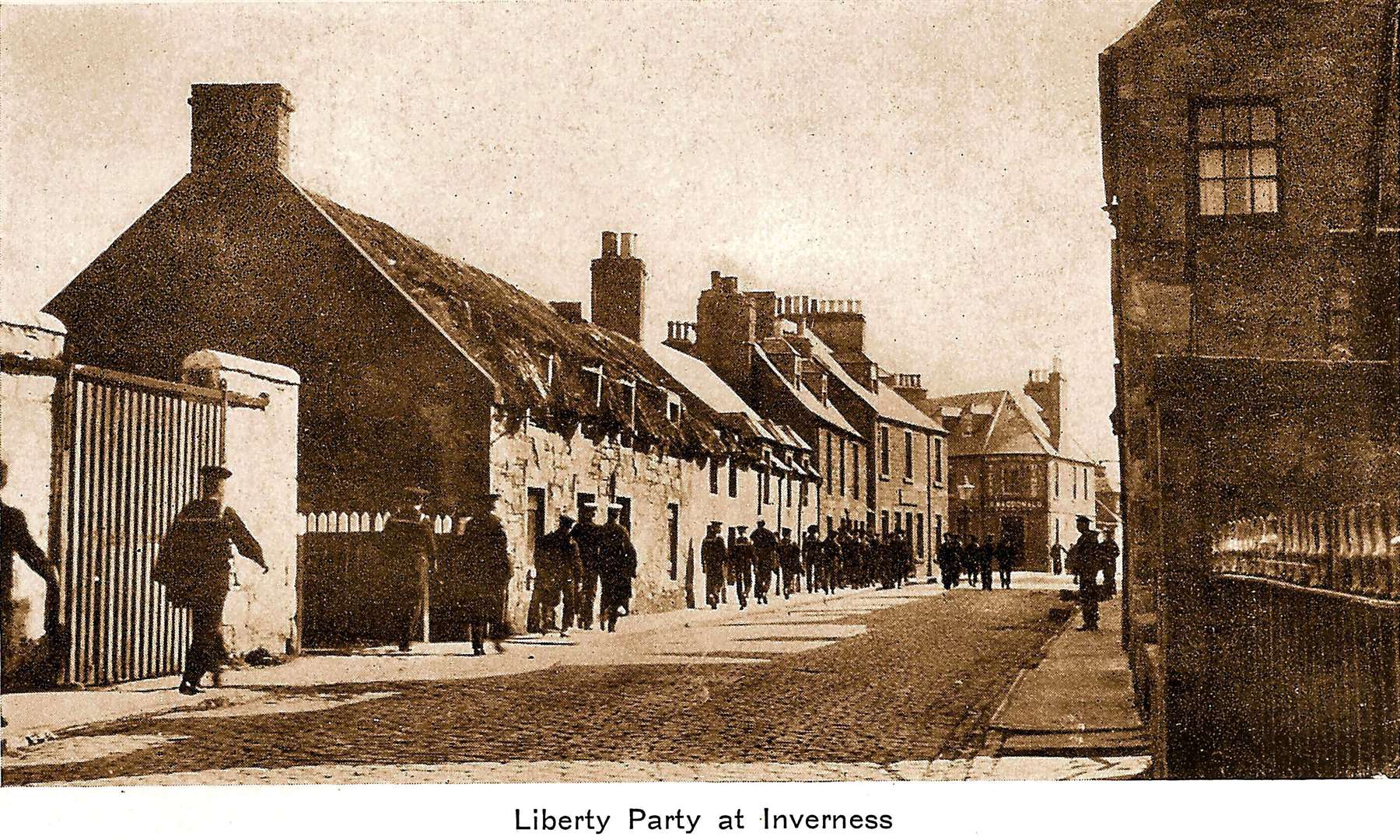 A liberty party of US sailors heads into Inverness town centre.
