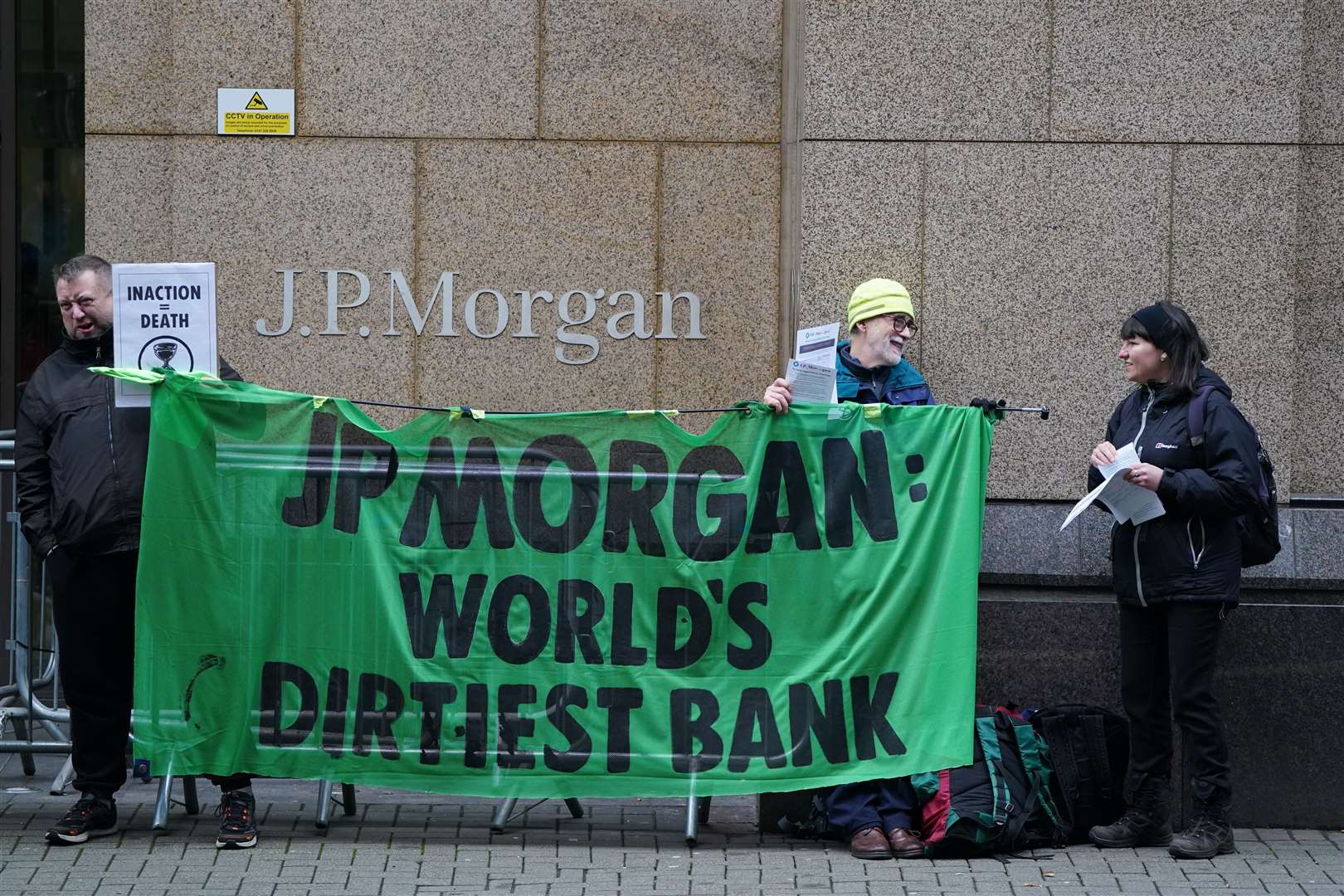 The activists accuse the bank of funding climate change (Andrew Milligan/PA)