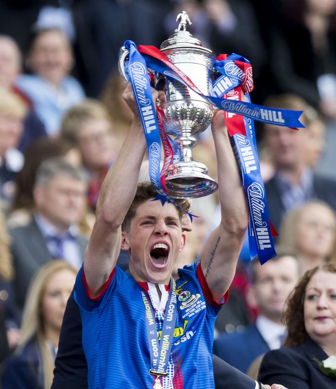 ICT's Ryan Christie celebrates with the Cup. Picture: Ken Macpherson, Inverness