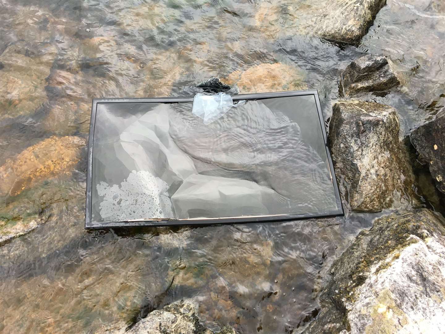 A television was pictured floating in the waters of Loch Ness.