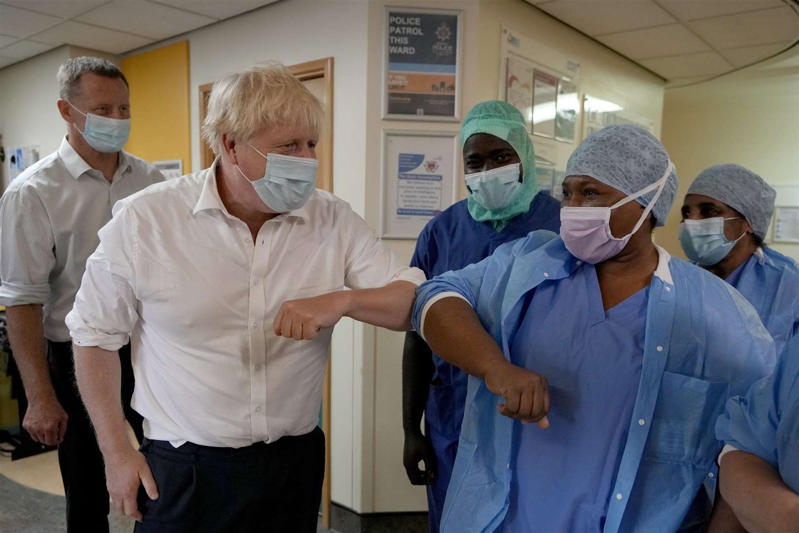Prime Minister Boris Johnson meets members of staff during a visit to the South West London Elective Orthopaedic Centre in Epsom, Surrey (Kirsty Wigglesworth/PA)