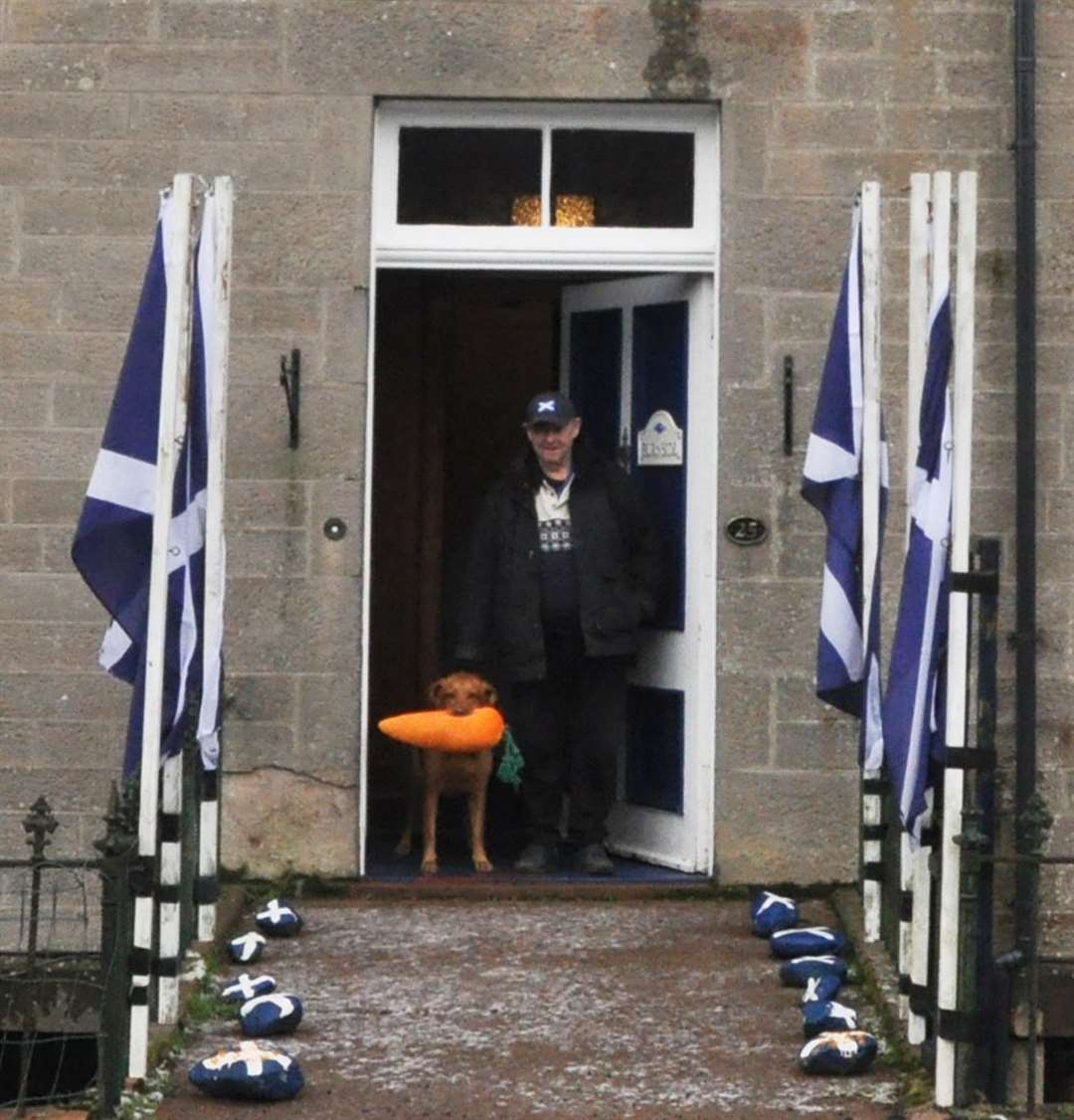 Allan was affectionately known as The Flag Man by passers-by thanks to the patriotic disopaly outside his front door.