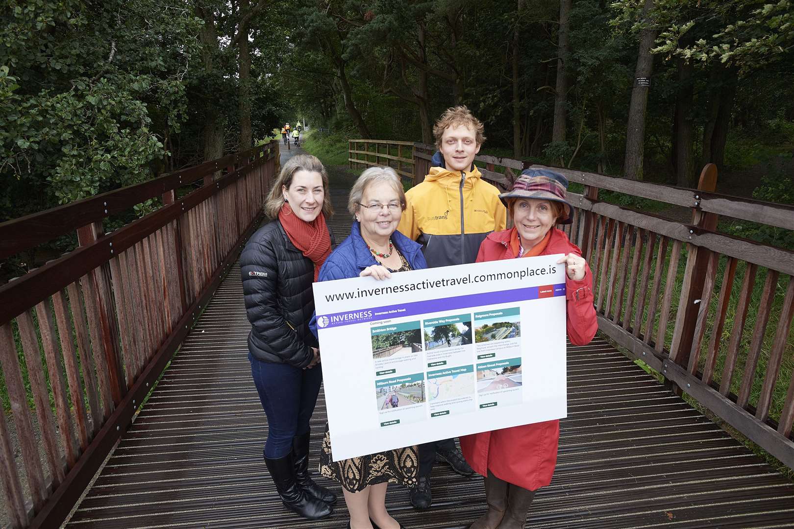 Councillor Trish Robertson (second left) promoting the new website at the recently opened bridge in Smithton.