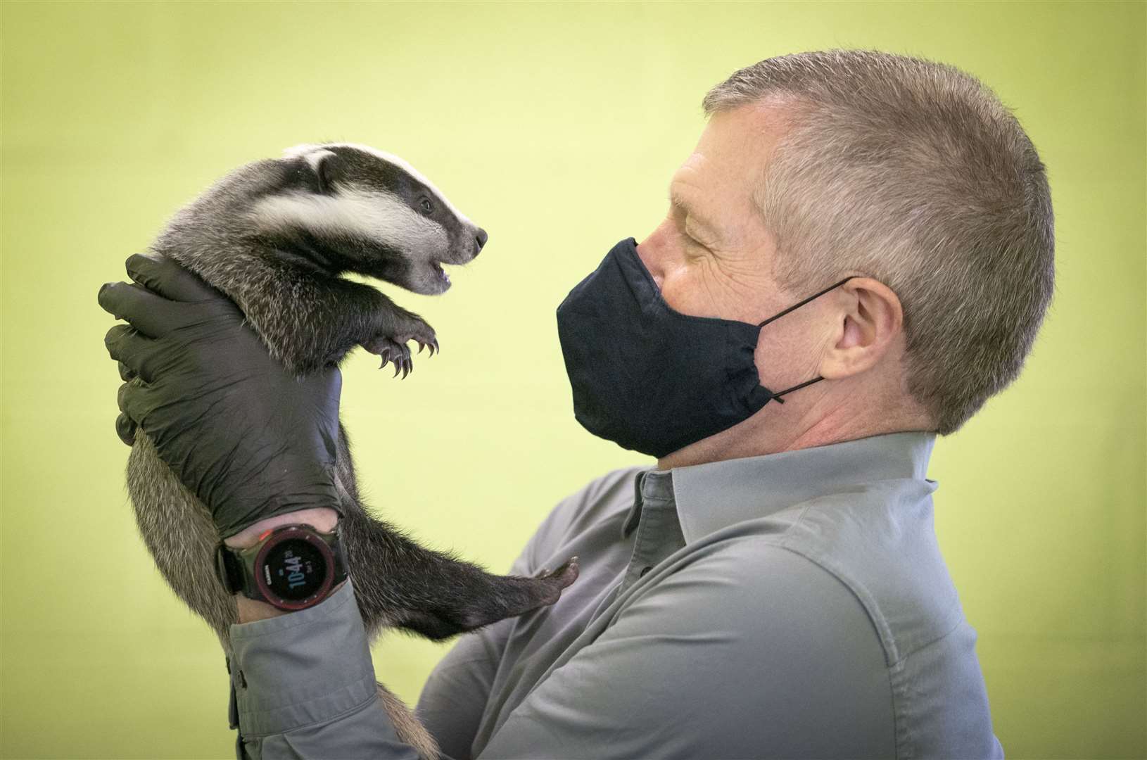 Scottish Liberal Democrat leader Willie Rennie handles a six-week-old badger during a visit to the SSPCA National Wildlife Rescue Centre at Fishcross near Alloa. Mr Rennie stood down as leader this year (Jane Barlow/PA)