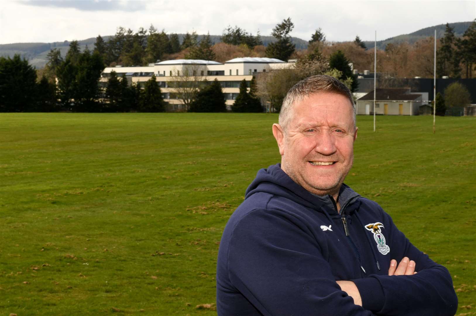 John Robertson, Inverness Caledonian Thistle sporting director, standing in the vacant playing field adjacent to Inverness Royal Academy.