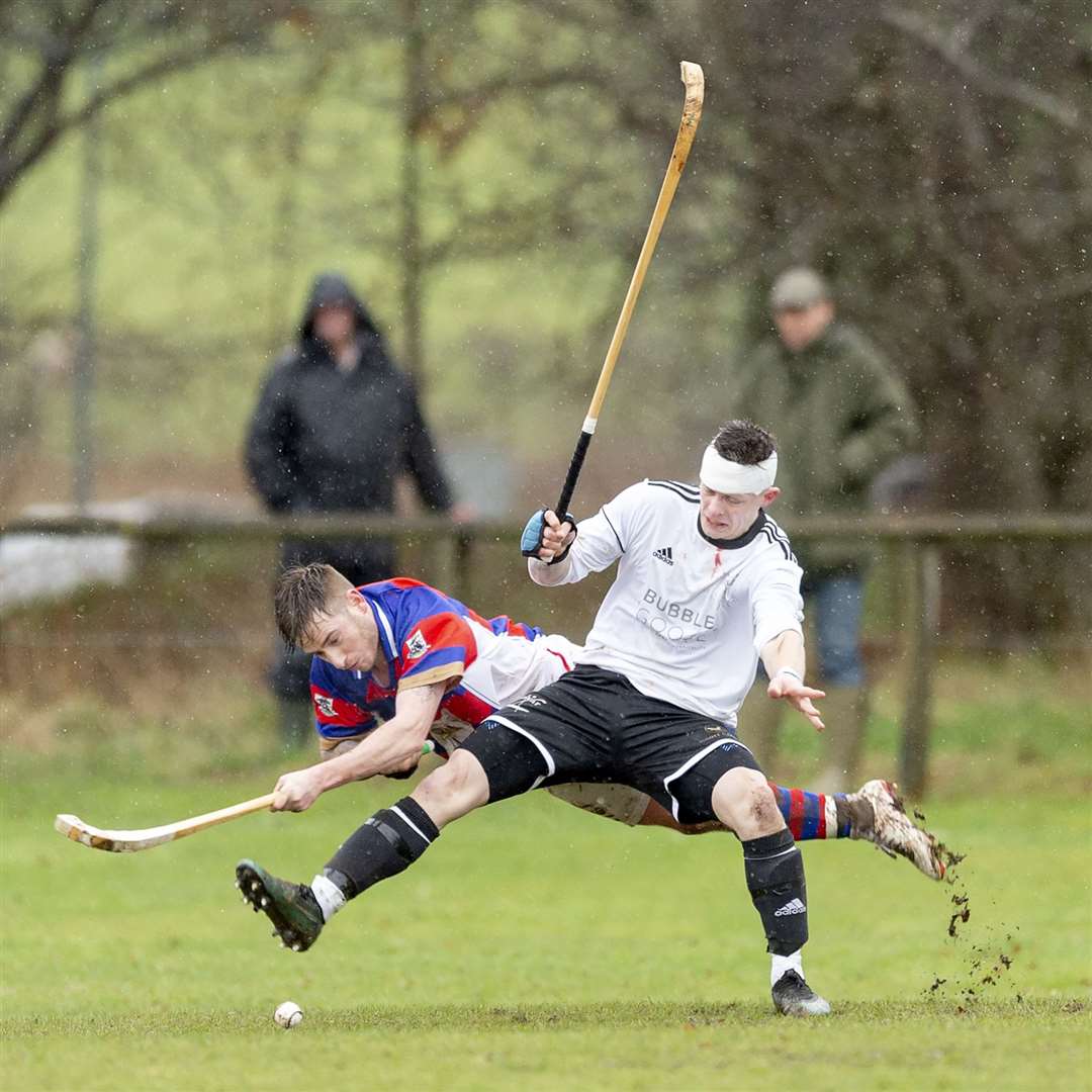Martin Mainland (Lovat) stands up to Fraser Munro (Kingussie) in the MOWI Premiership. Picture: Neil Cameron