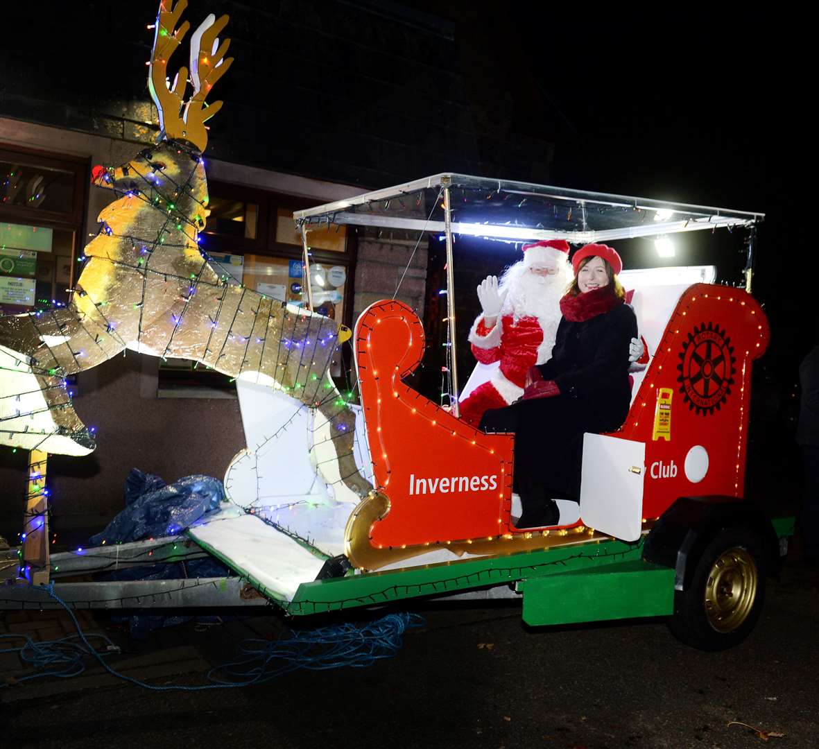 STV's Nicola McAlley joins Santa for the switch on of the lights on his new sleigh.