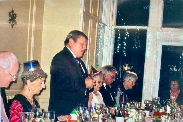 Mario Pagliari saying the Grace before one of the circle's Christmas meals.