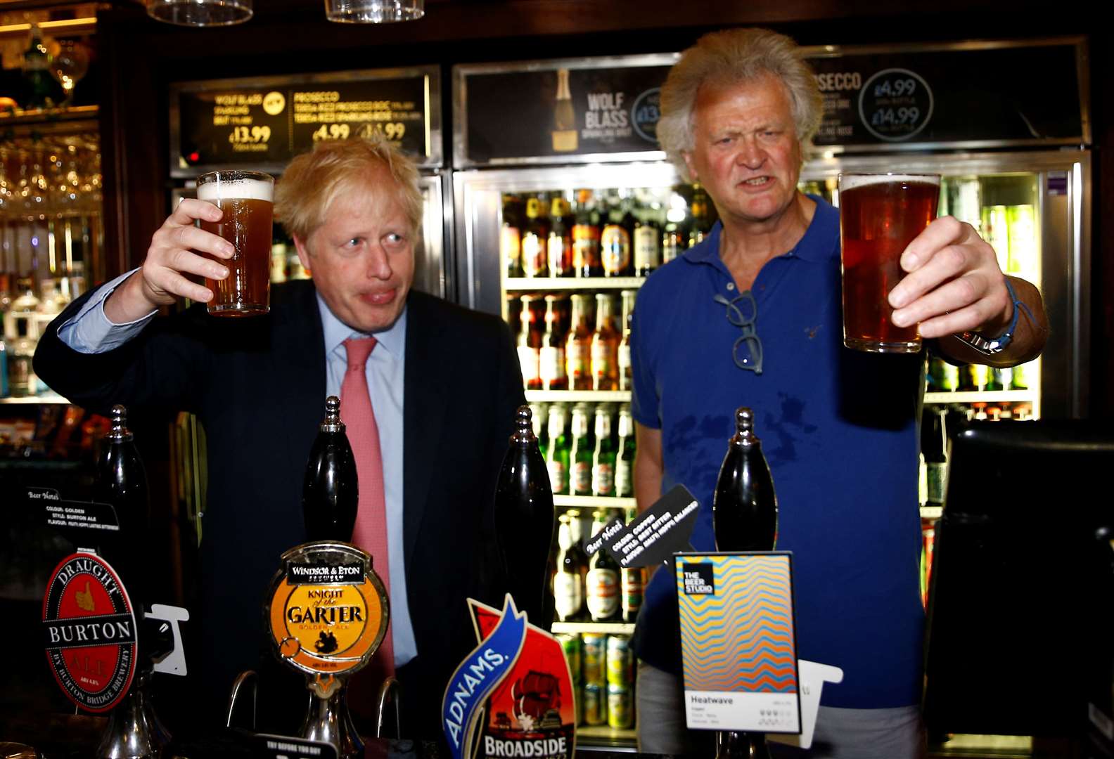 Boris Johnson (left) during a visit to Wetherspoon Metropolitan Bar in London with Tim Martin (Henry Nicholls/PA)