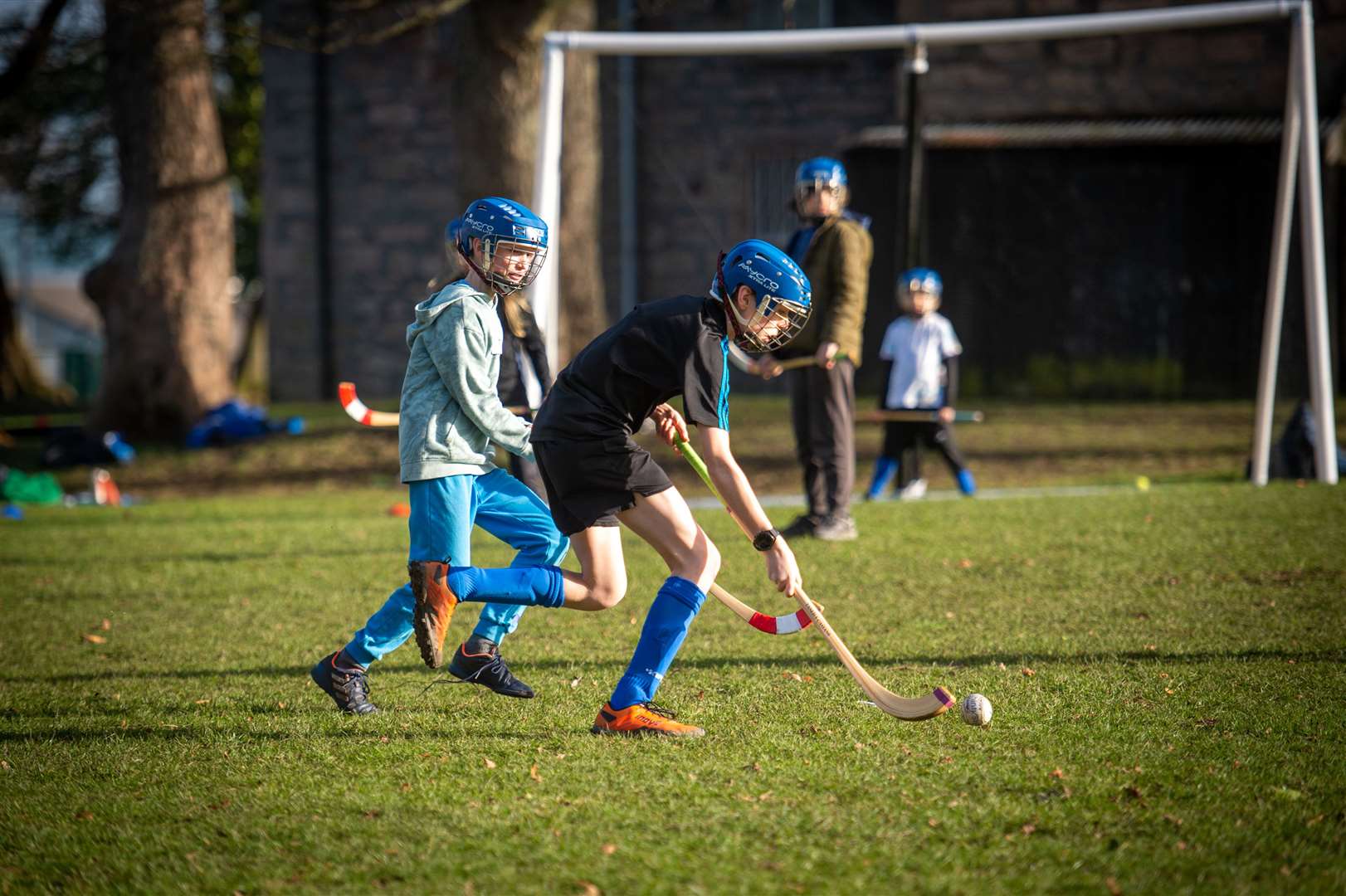 Action from the Shinty event.  Image: Callum Mackay..