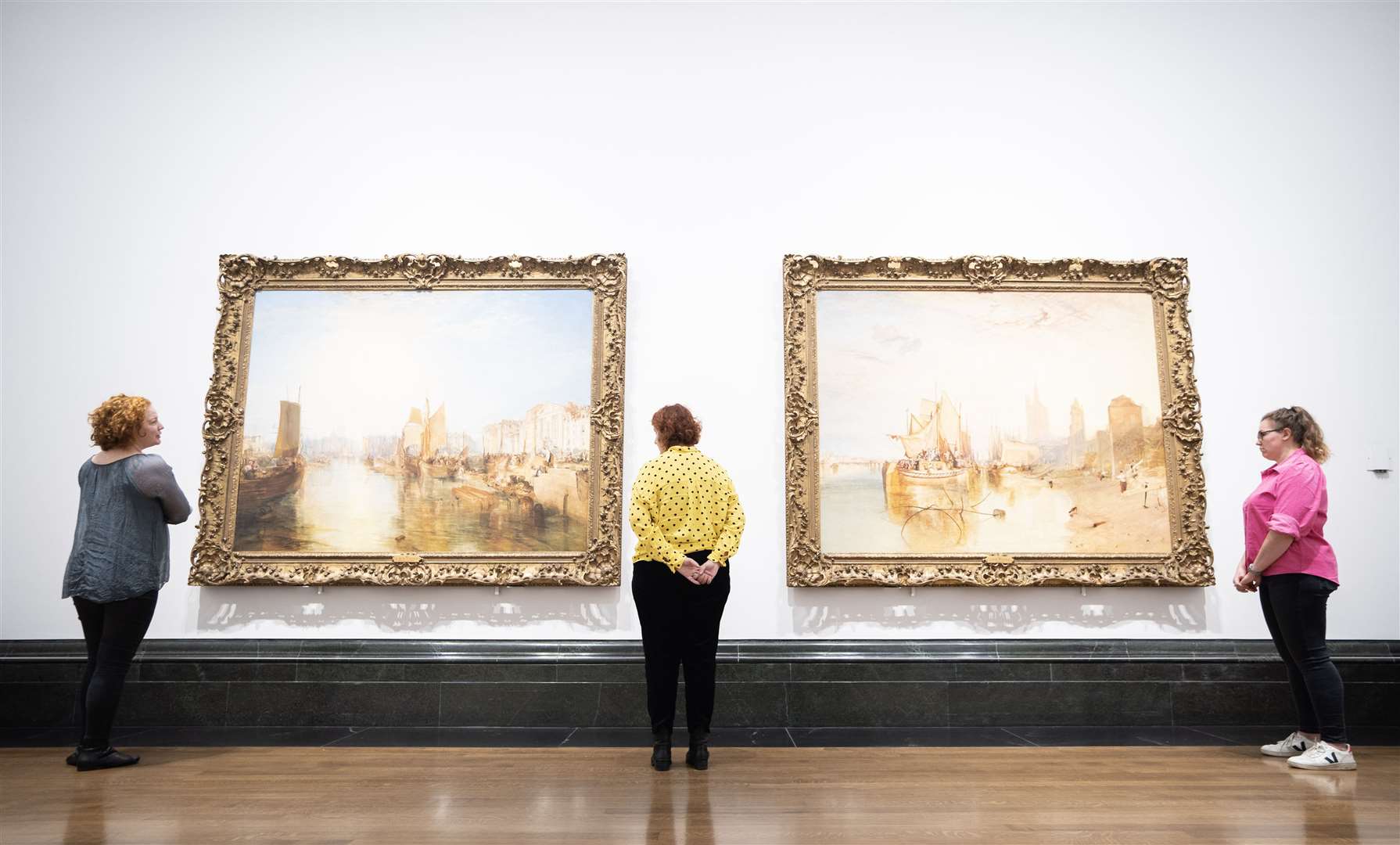 People attend the press view for the Turner on Tour exhibition at the National Gallery, London (James Manning/PA)