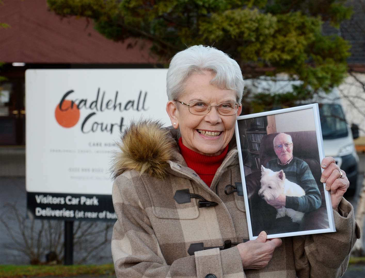Anne Chambers with picture of husband Brian outside Cradlehall Court Care Home...Picture: Gary Anthony..